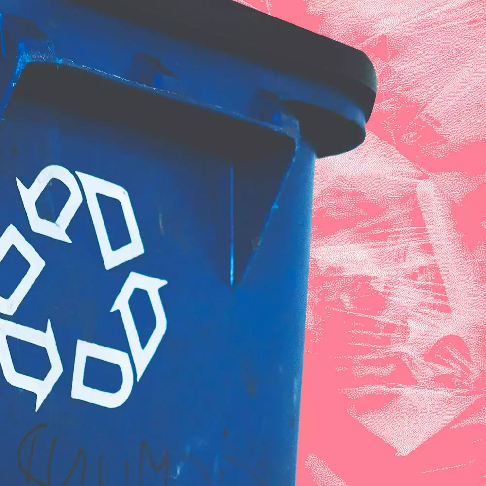 Poubelle avec symbole du recyclage